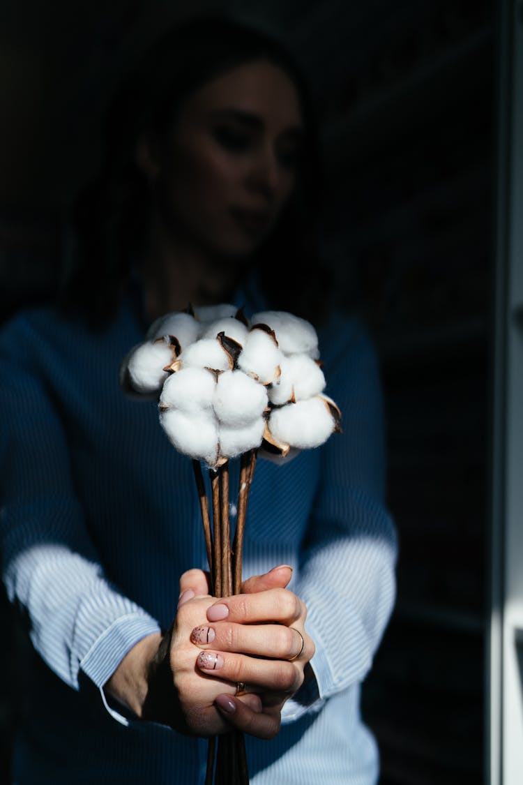 Woman Holding White Cotton Shape Flower Ornament