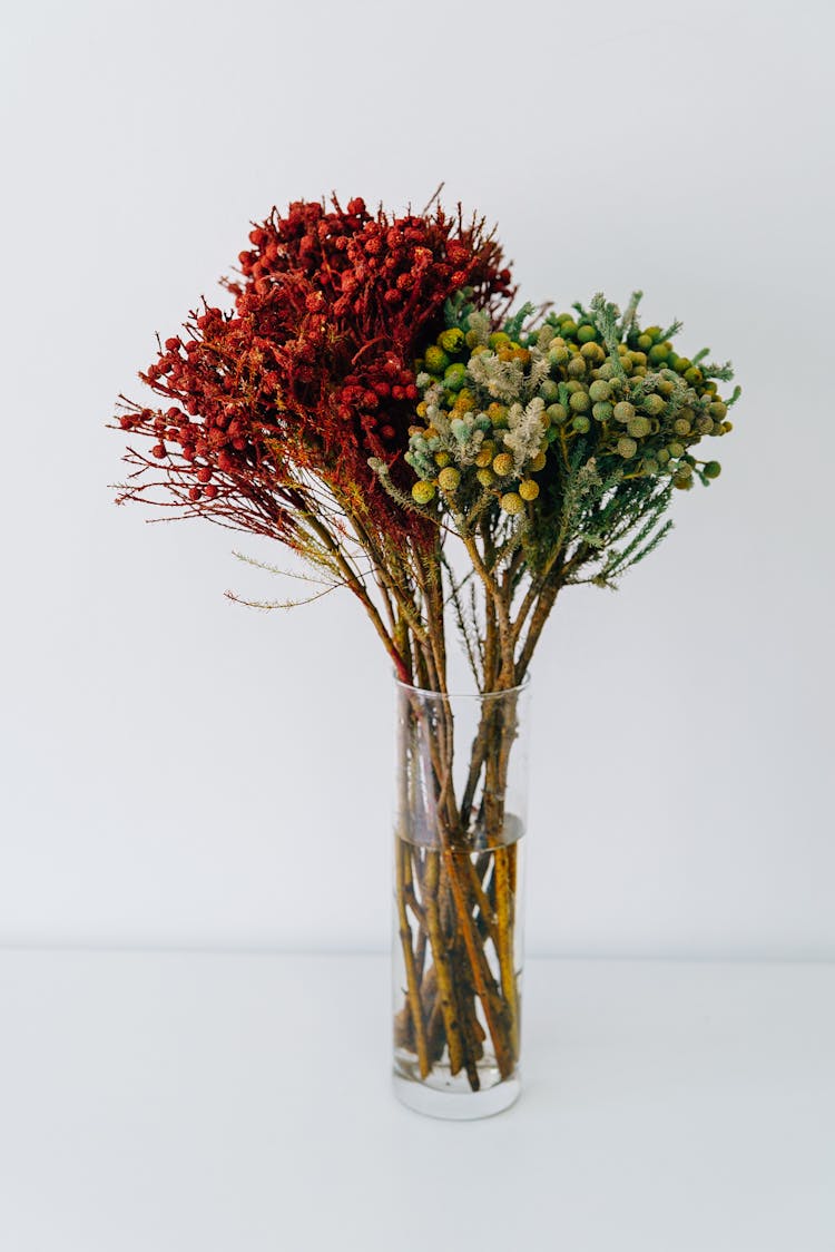 Bunch Of Flowers In A Glass Vase 