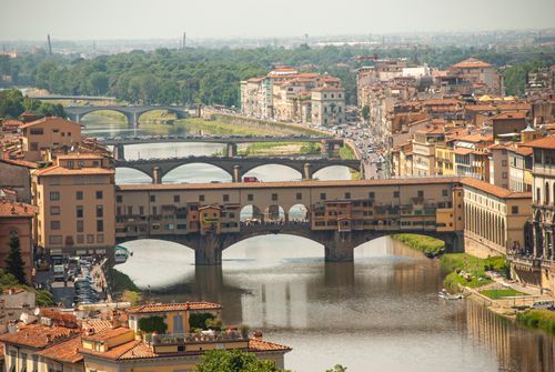 Free Aerial view of Ponte Vecchio and surrounding architecture in Florence, a historic Italian city. Stock Photo