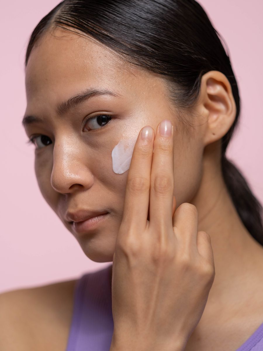Woman enjoying a calming skincare routine