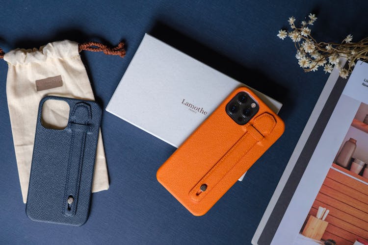 Orange Smartphone On The Table