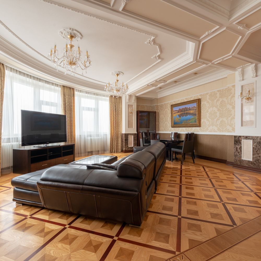 Painters and Decorators in Elm Park — dust sheets down and the room fully protected