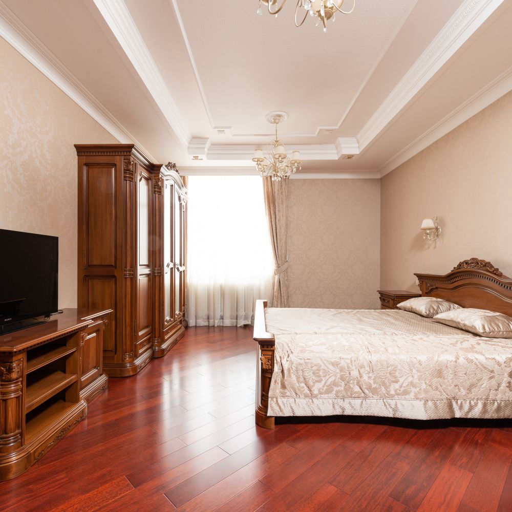 Guildford — professional movers carrying furniture on a house move