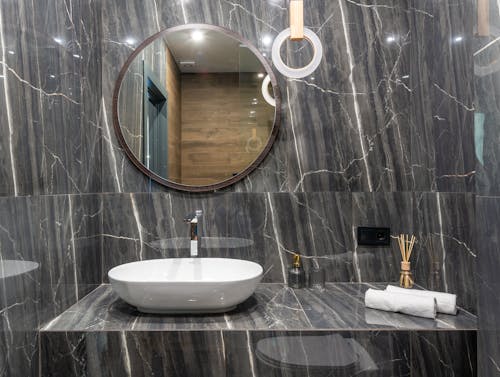 A White Ceramic Sink in the Bathroom