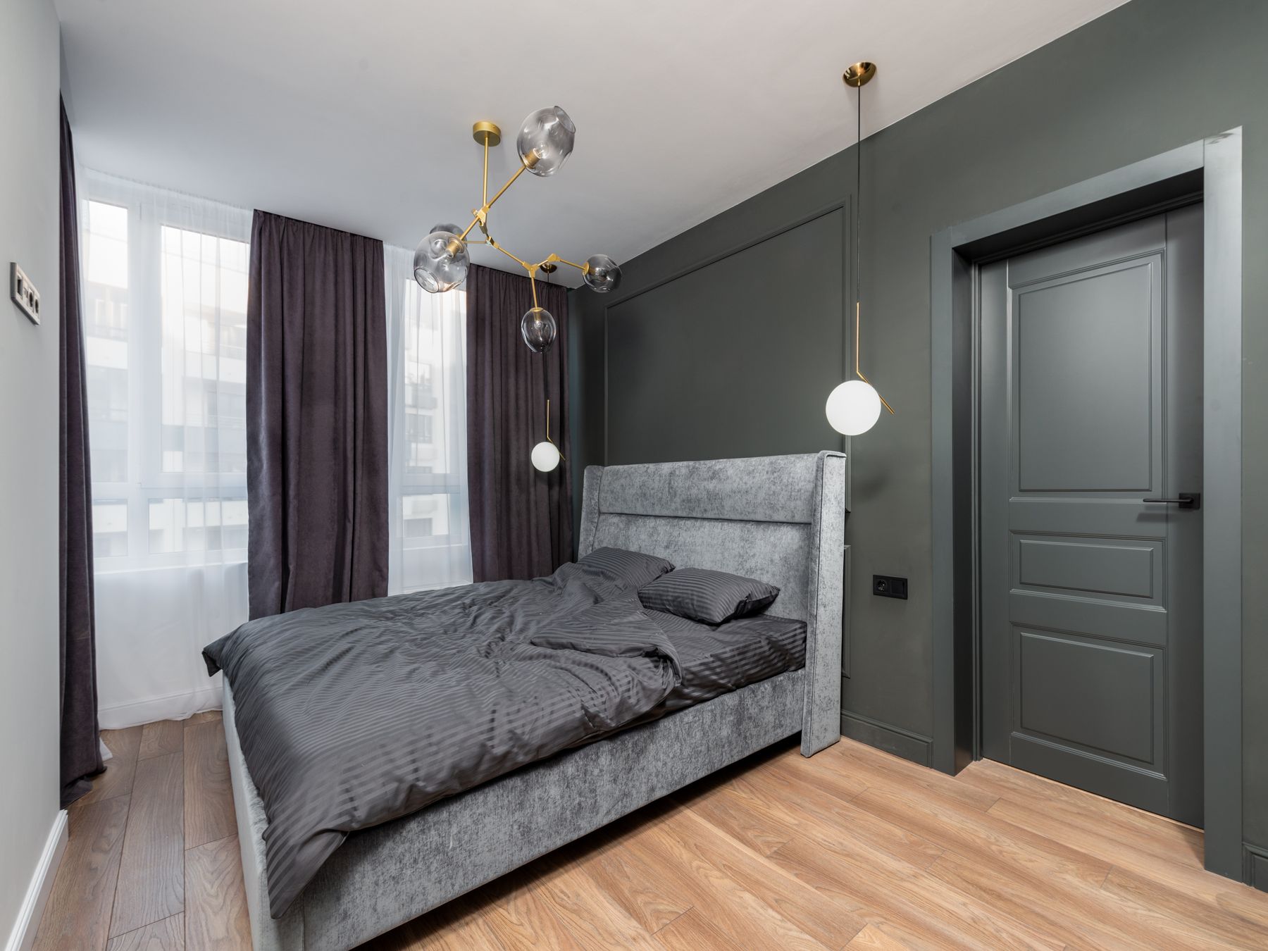 Wallpapering in Havering-atte-Bower — quality trade paint going on in two coats