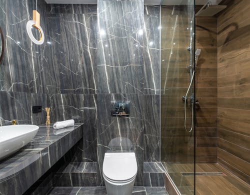 A White Ceramic Sink and Toilet Bowl