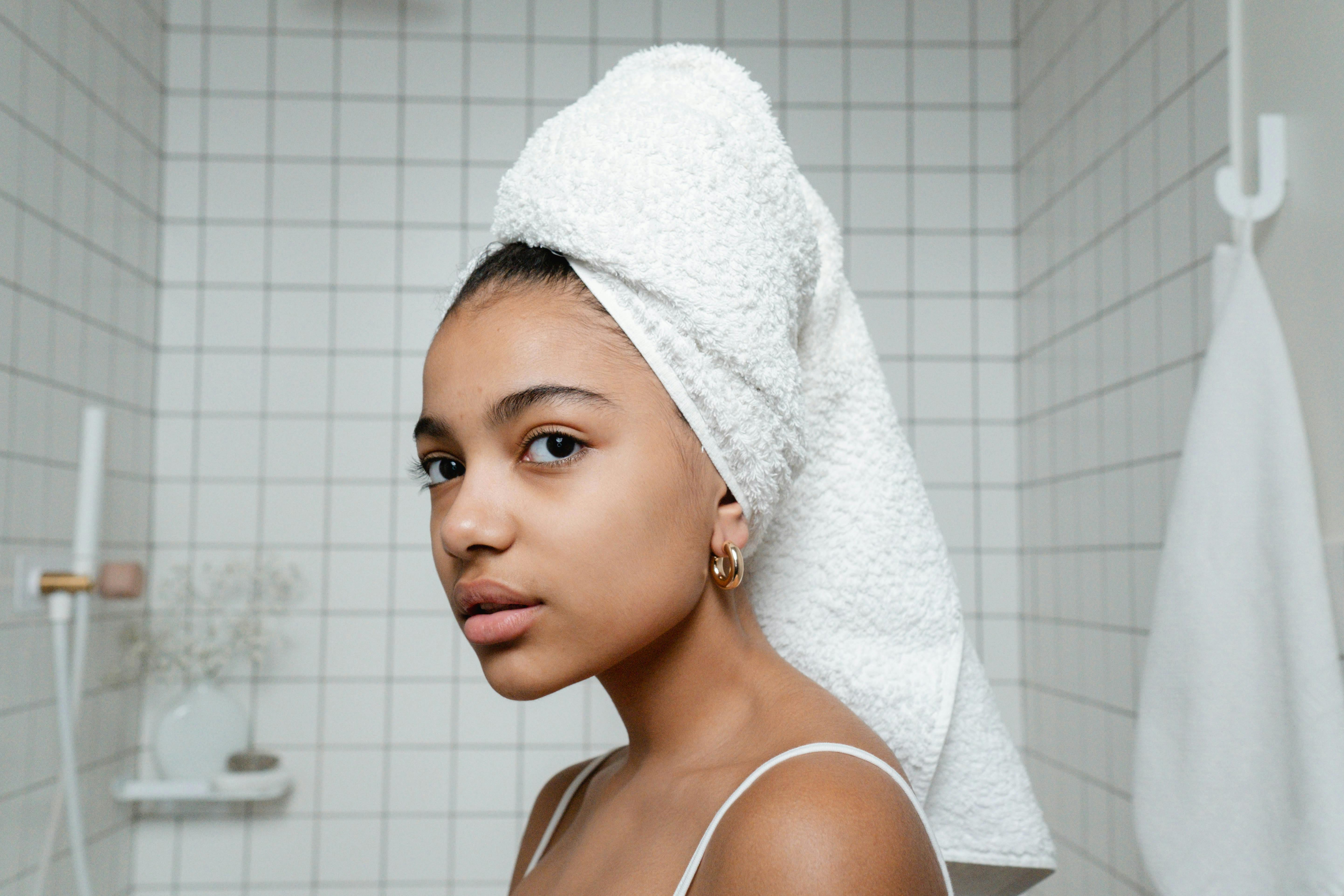 Young Woman In White Towels Wrapped Around Head And Body After Shower Stock  Photo - Download Image Now - iStock