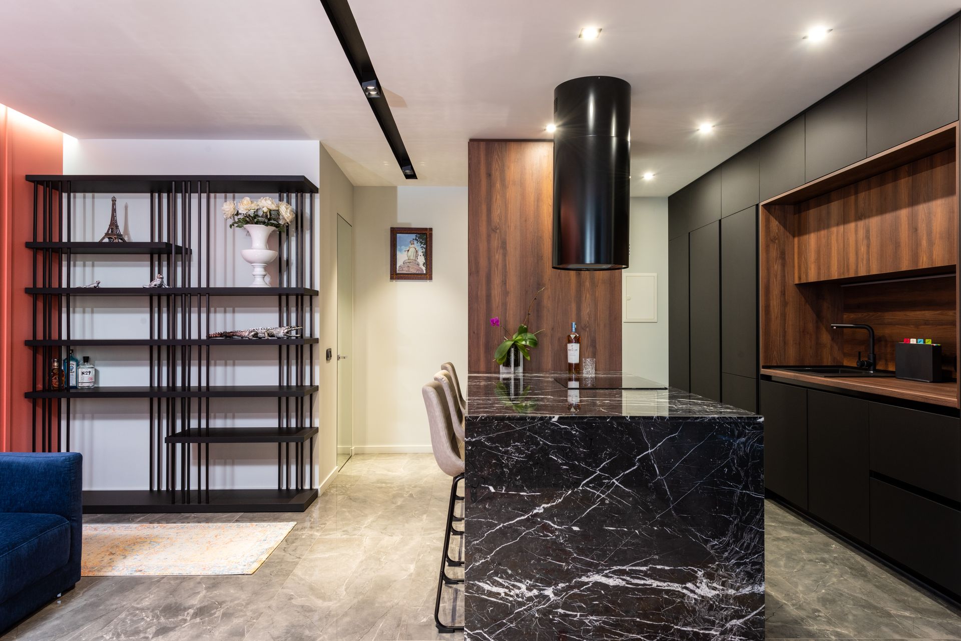 Bright modern kitchen with hardwood floors after a full remodel