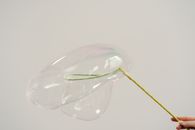 Clear Glass Ball With Yellow Straw