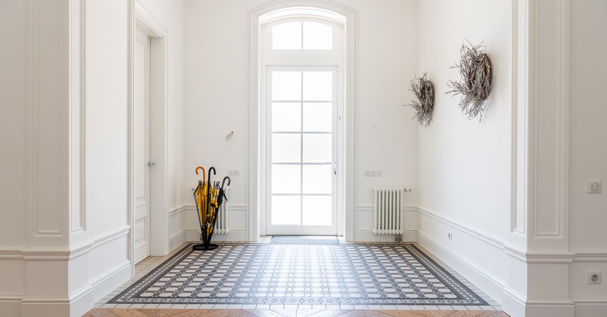 Welcoming, tidy entryway prepared for a home showing or open house
