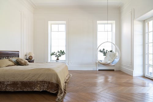 Spacious Bedroom with a Brown Bed