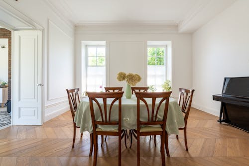 Free Wooden Chairs on a Dining Area Stock Photo