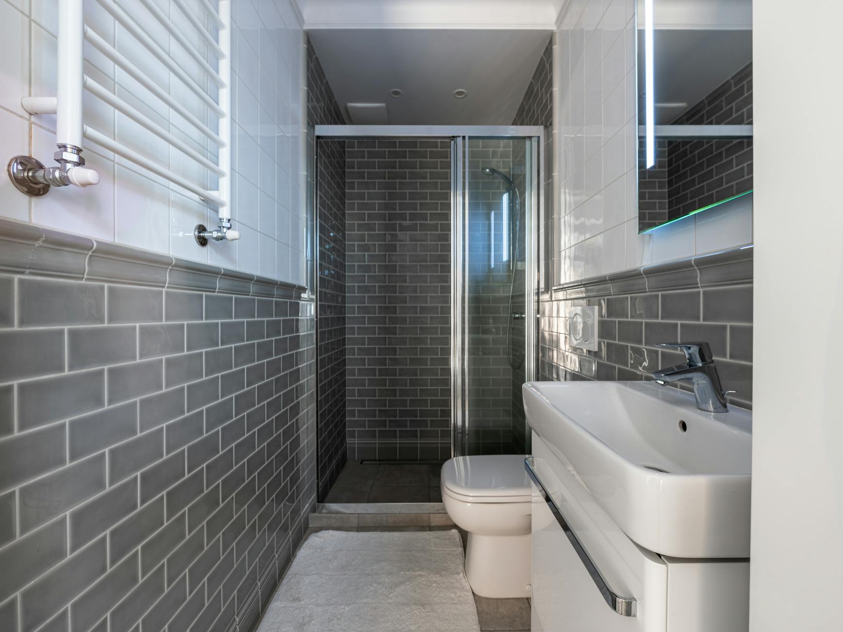 Spacious Bathroom with Tiled Walls