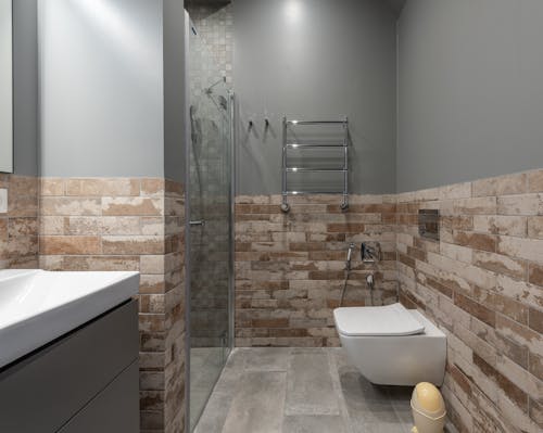 Free Modern Interior of a Brick Tile Bathroom Stock Photo