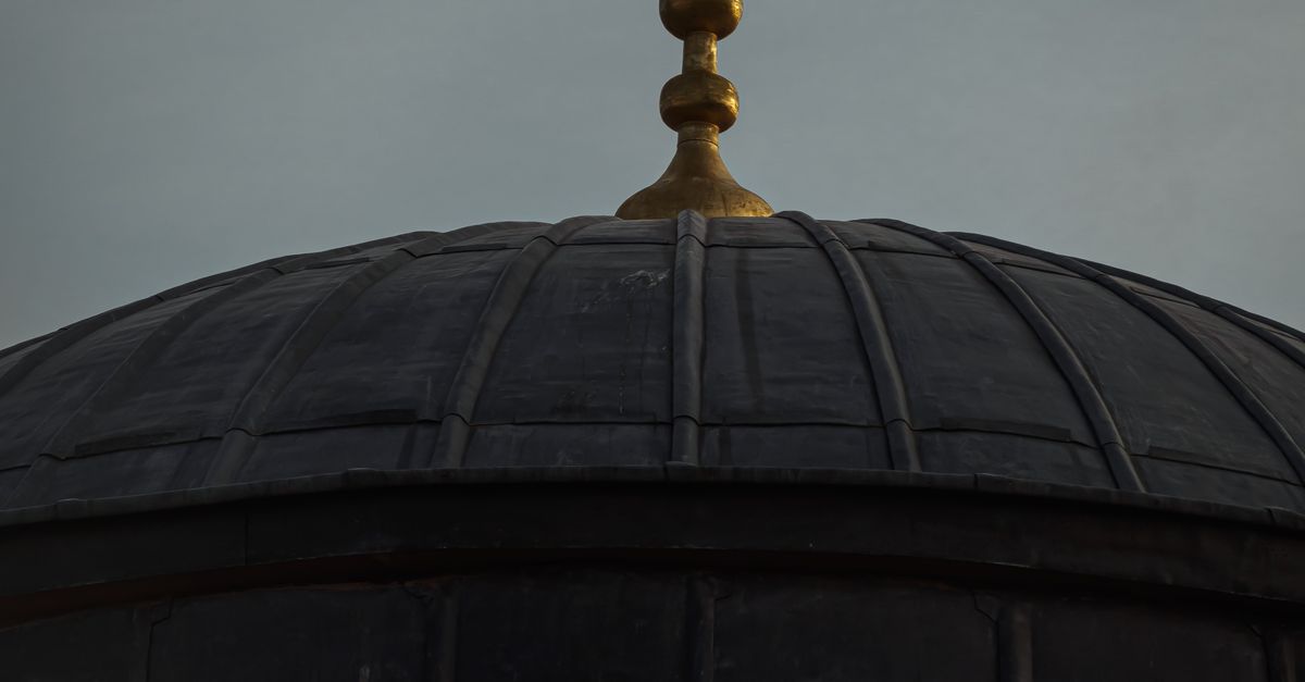 Mosque Grey A Gray Mosque with Crescent Moon Symbol Under Gray Sky · Free Stock Photo