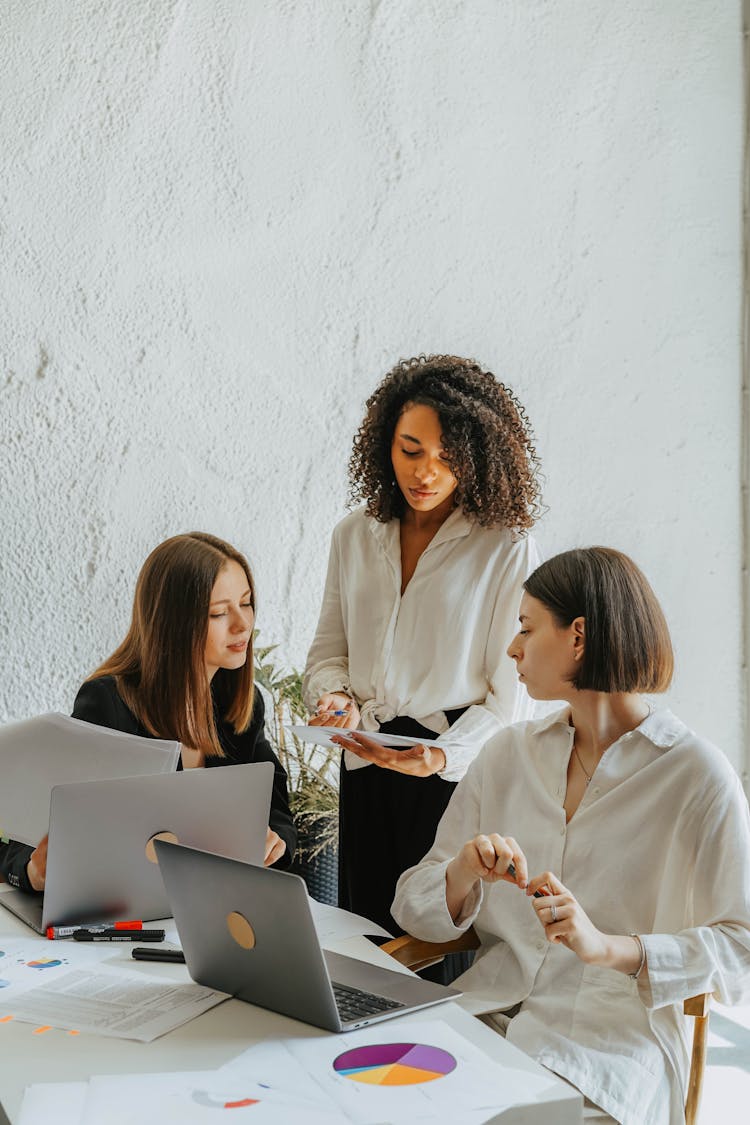 Women Working Together In The Office