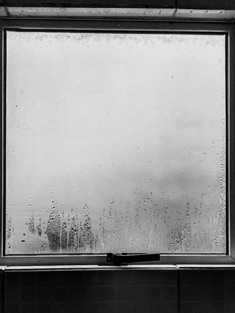 Misty Glass Window On The Wall