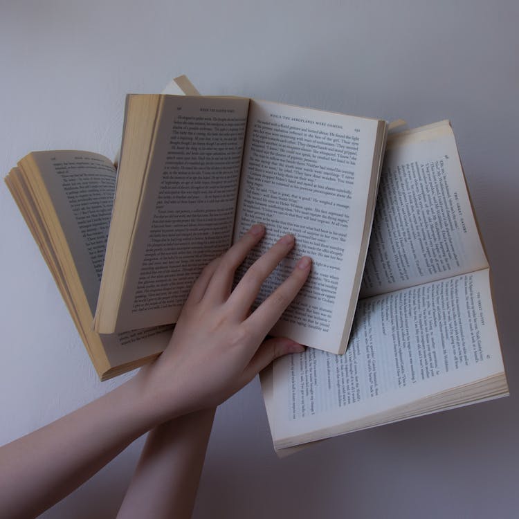 Hands holding an open empty book background Stock Photo by BrianAJackson
