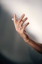 Person Wearing Silver Ring With White Manicure