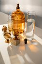 Clear Drinking Glass on White Table