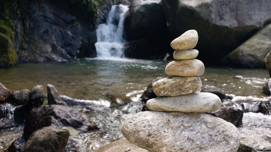 three stacked stones balance
