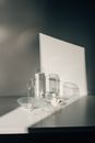 Clear Glass Pitcher on White Table