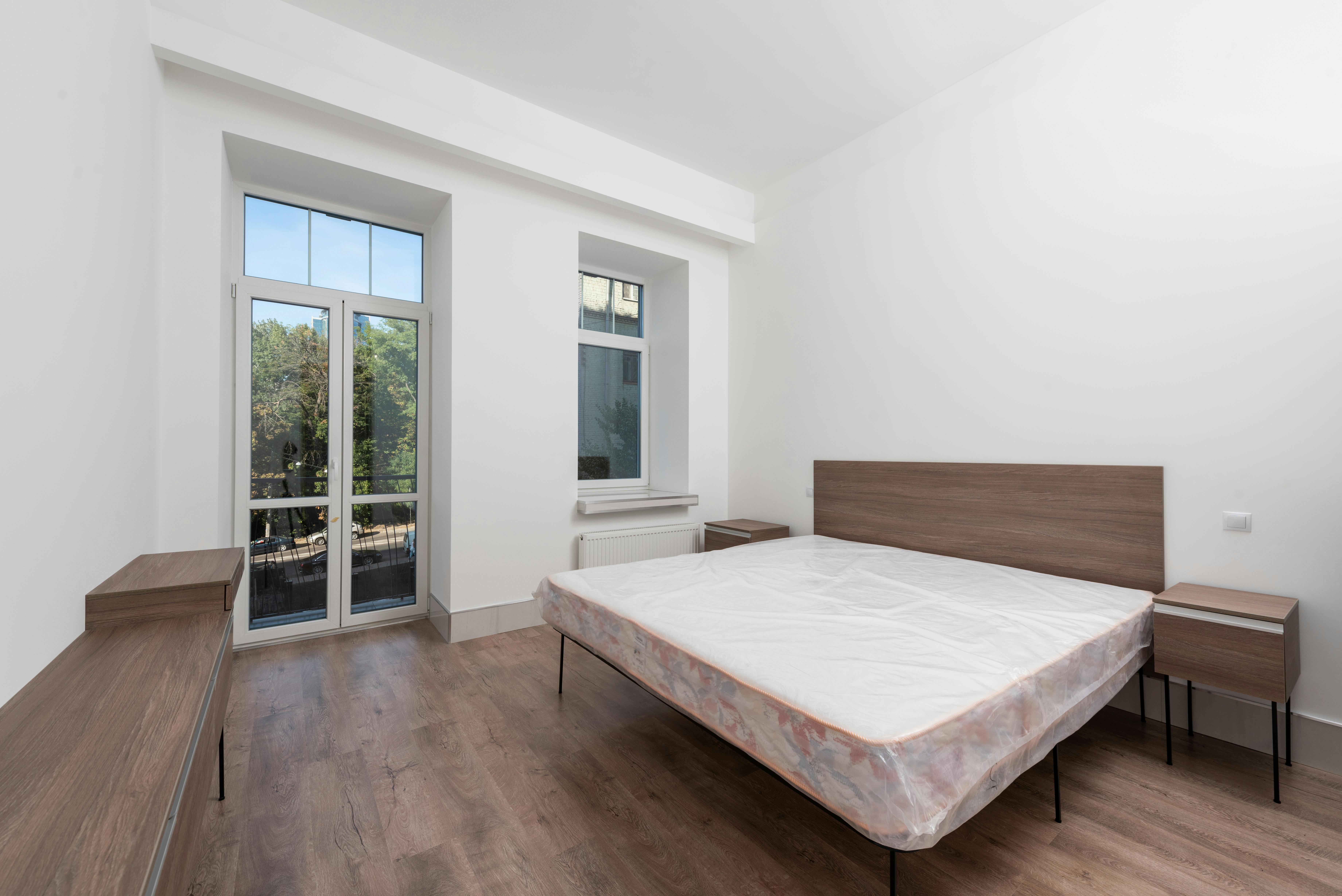 Person struggling with cluttered and disorganized room