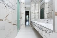 White Ceramic Sink Near Green Wall