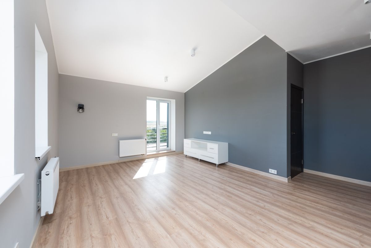 Same room styled as an elegant living room after renovation by Beyond Briks