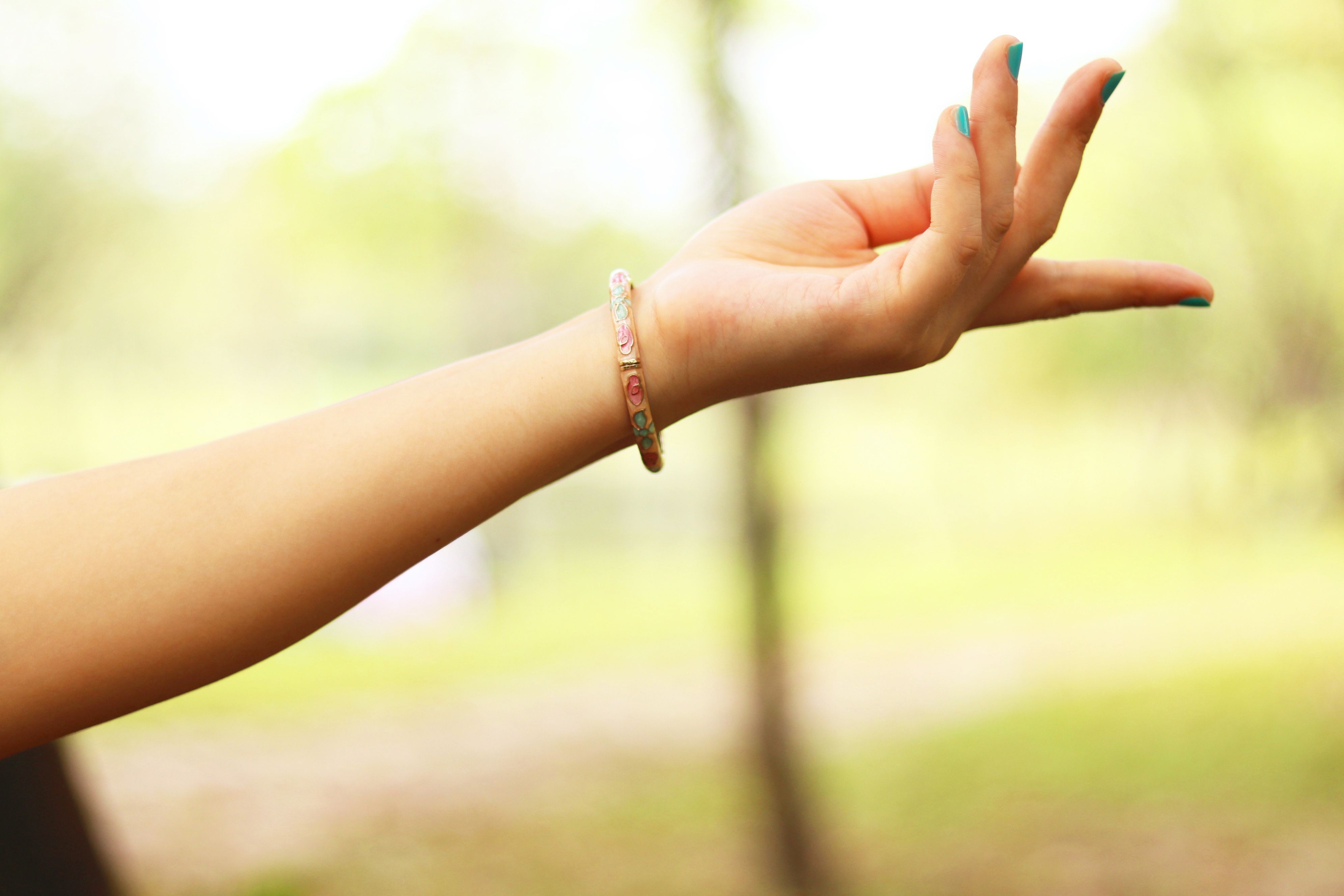 Close-Up Photography of Girl's Left Hand Wearing Bracelet ...