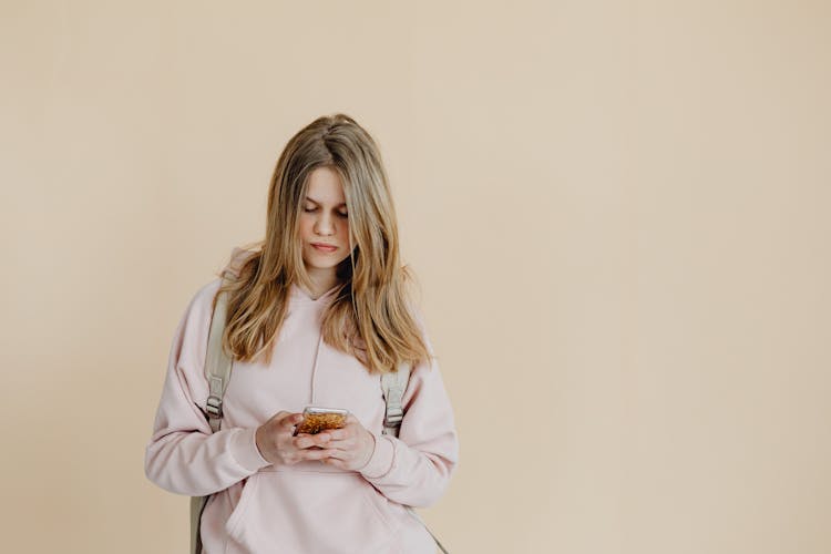 A Teenager Using Her Smartphone