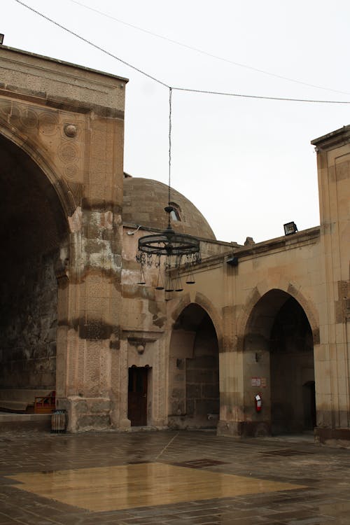 Chandelier Made of Steel Hanging Over the Courtyard