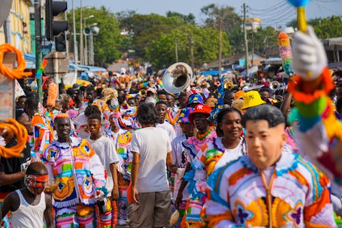 People Wearing Colorful Costume in the Street Parade