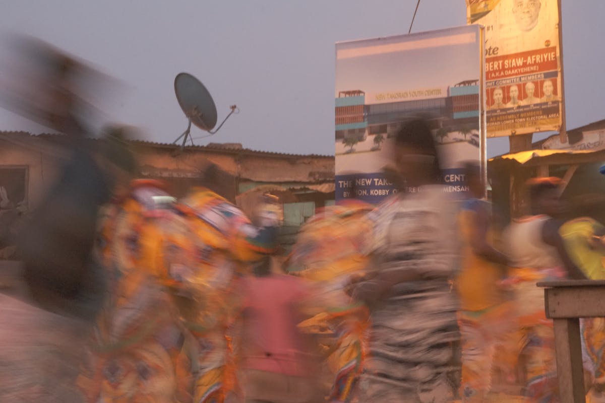 Virtual concert with digital avatars performing on a large screen