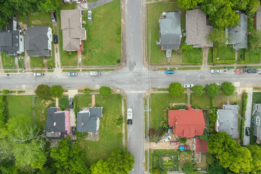 Aerial view of a suburban neighborhood intersection in Stone Oak, San Antonio