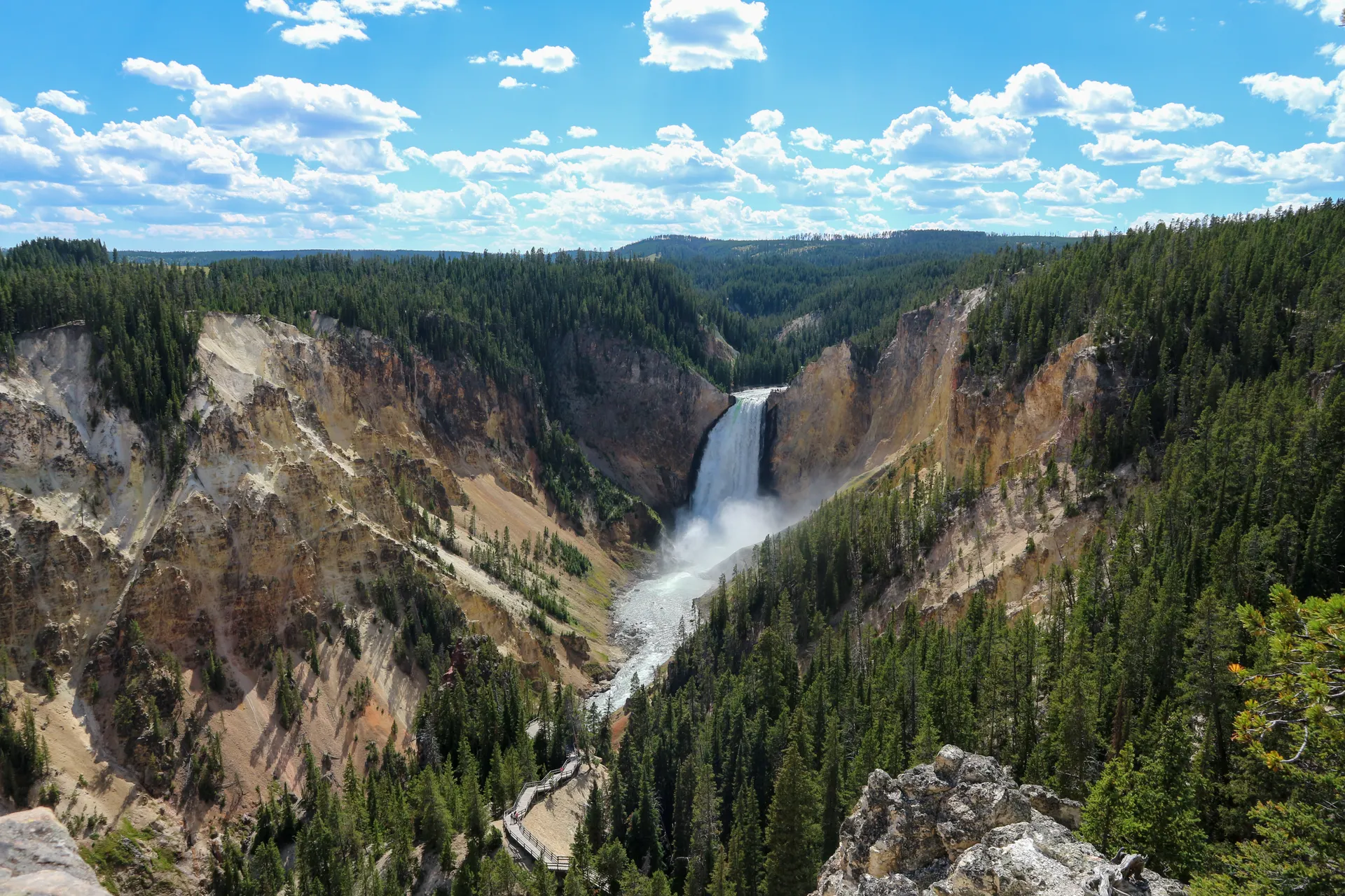 Morning light over the Grand Canyon of the Yellowstone and its lower falls Morning light over the Grand Canyon of the Yellowstone and its lower falls