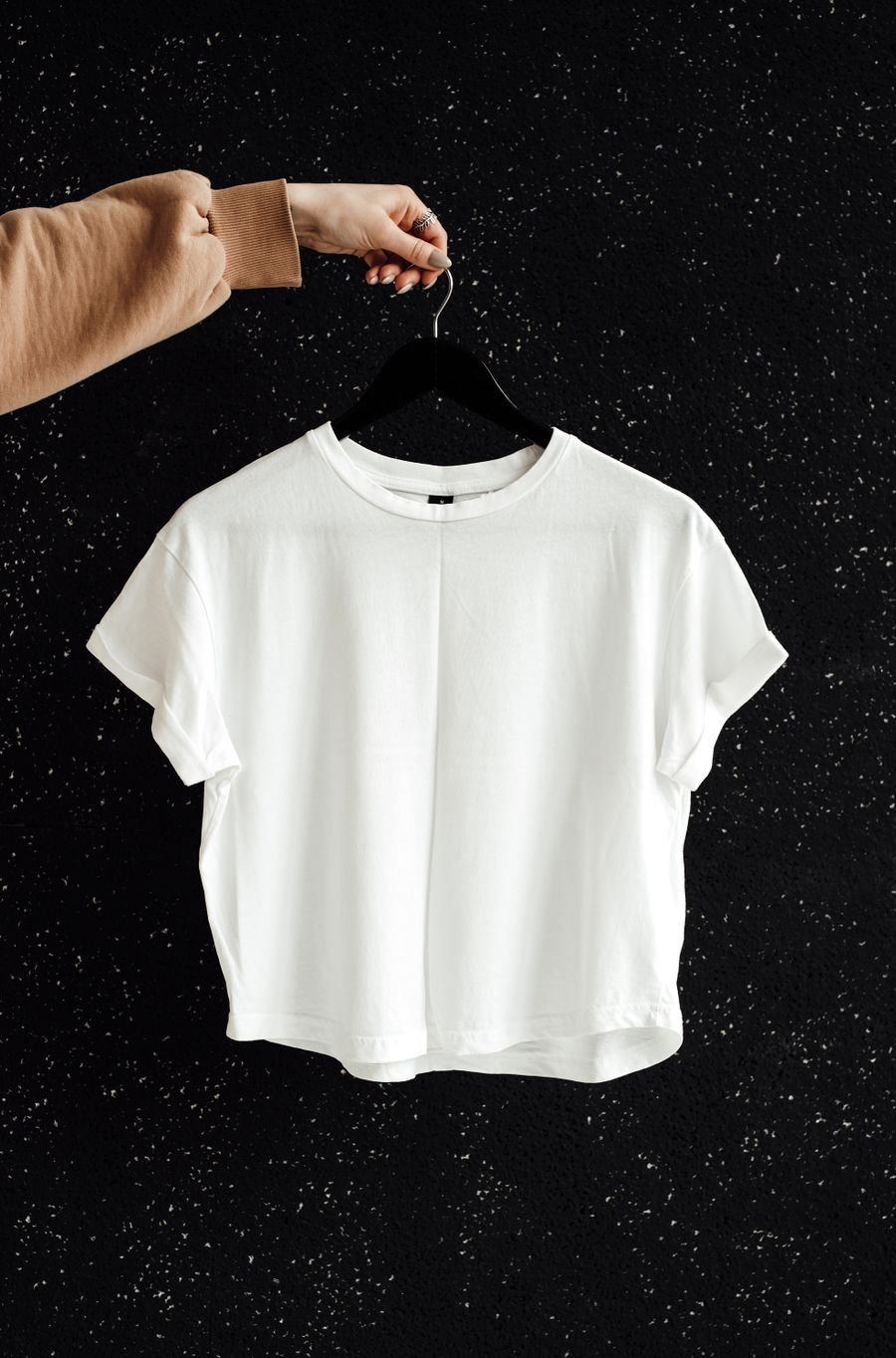 Puma essential training tank top on a hanger