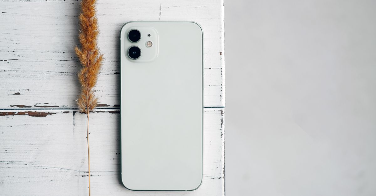 A single smartphone on a white surface representing mobile-first indexing and how Googlebot prioritises mobile content