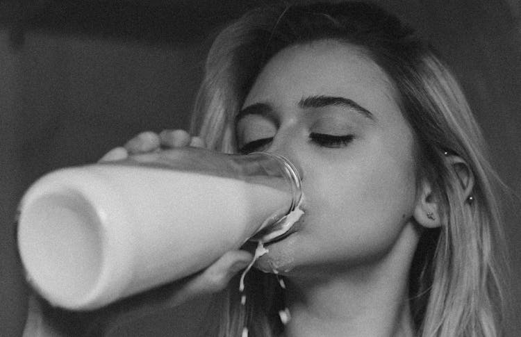 
Girl Drinking Milk From The Bottle