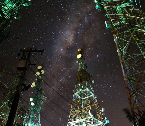 Towers against Night Starry Sky