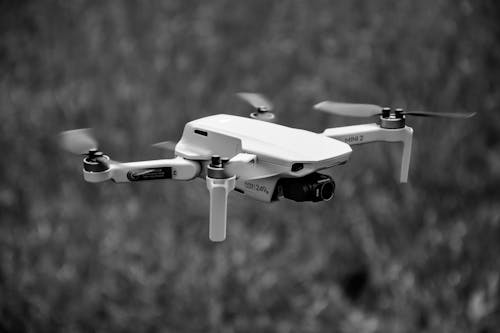 Close Up Photography of a Drone in Grayscale
