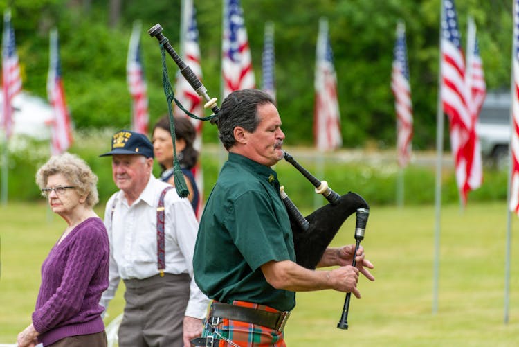 Photo Of A Man Playing Bagpipes 