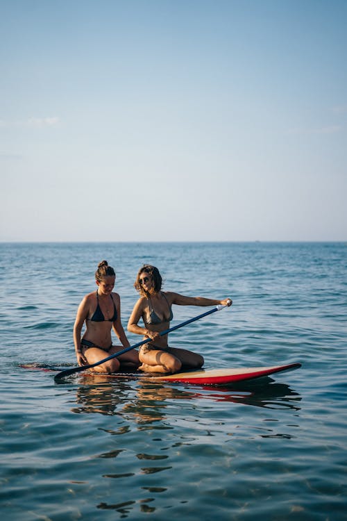 Two Women on Paddle Board