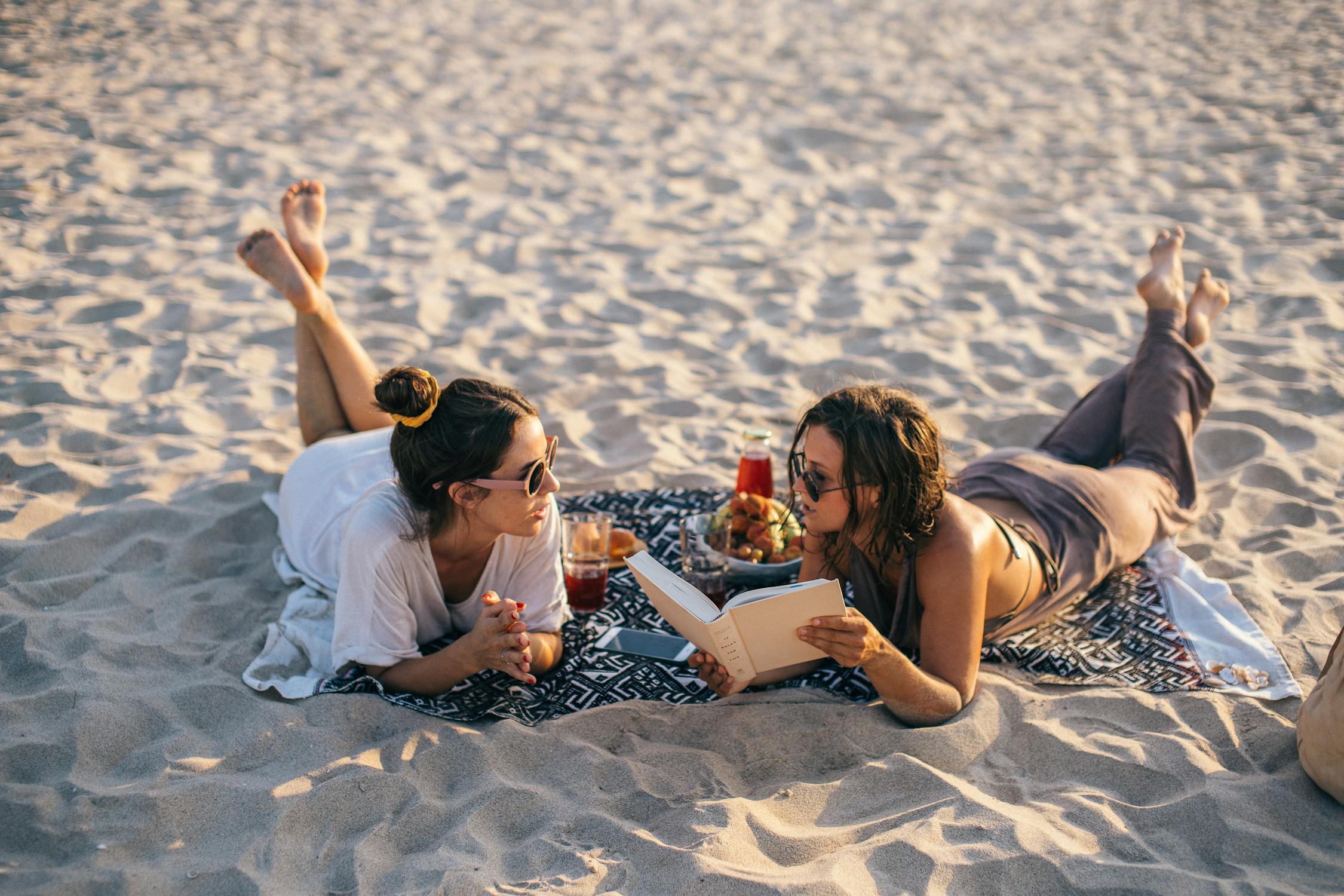 Women Talking Together in the Beach
