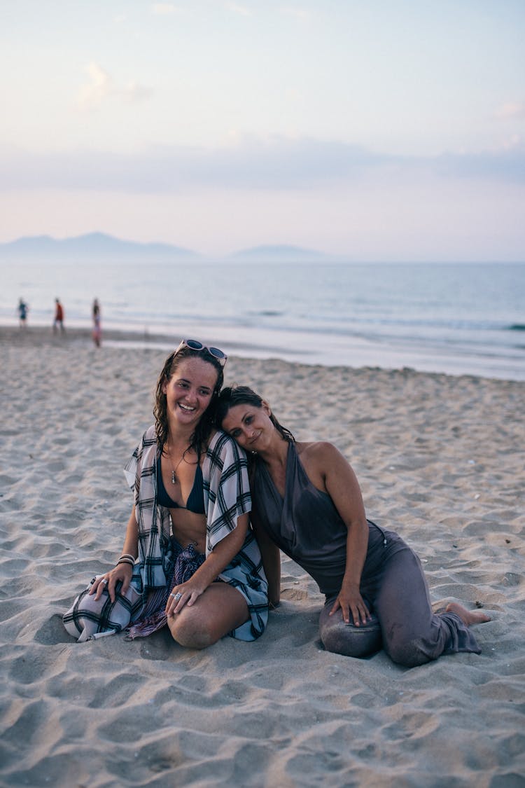 Happy Friends Bonding At A Beach