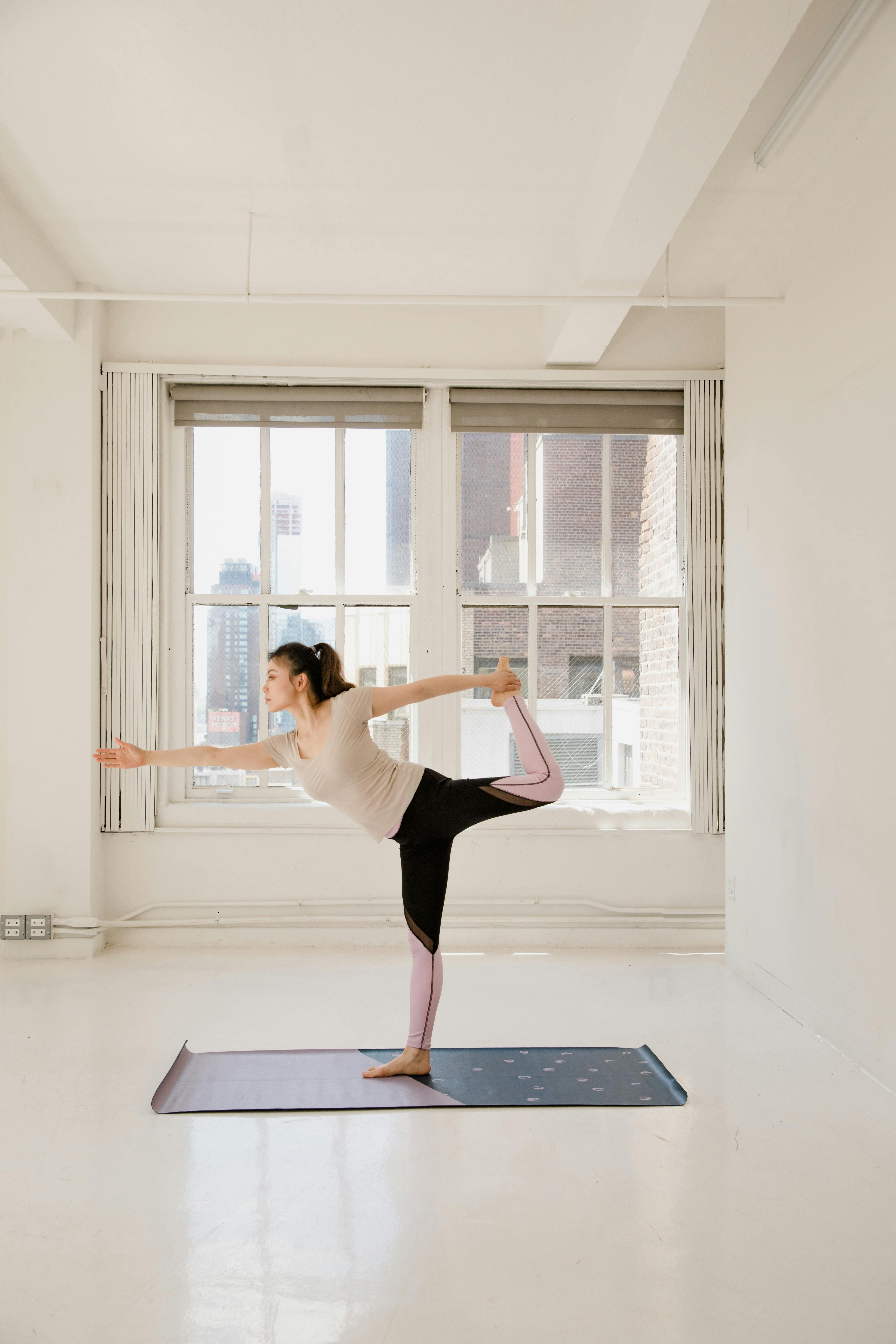 Side View of a Woman Doing Exercise · Free Stock Photo