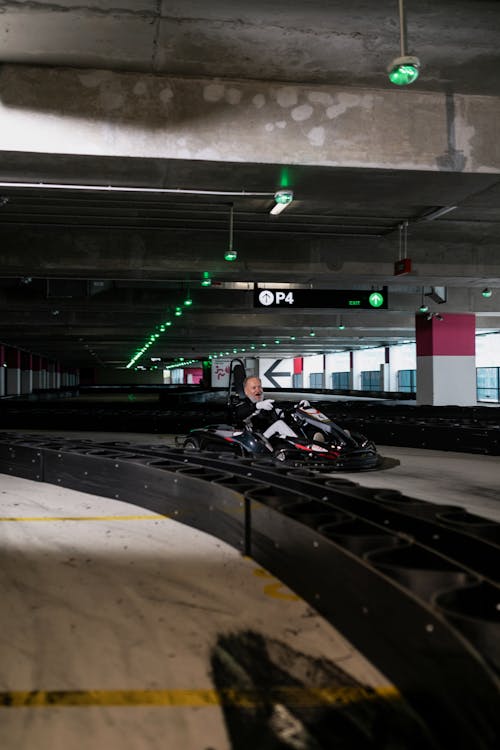 Ederly Man riding a Kart Wheel 