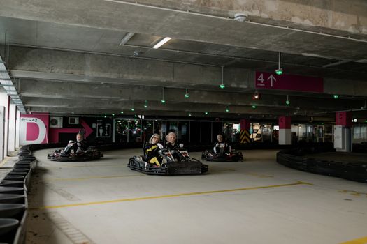 Elderly People riding Go Kart 