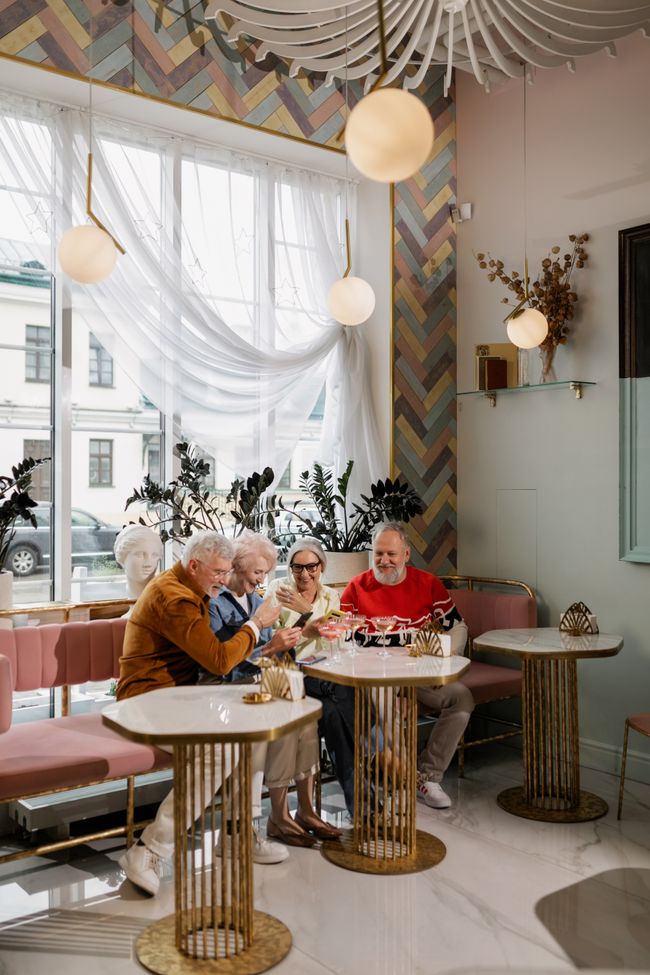 Older friends enjoying conversation together
