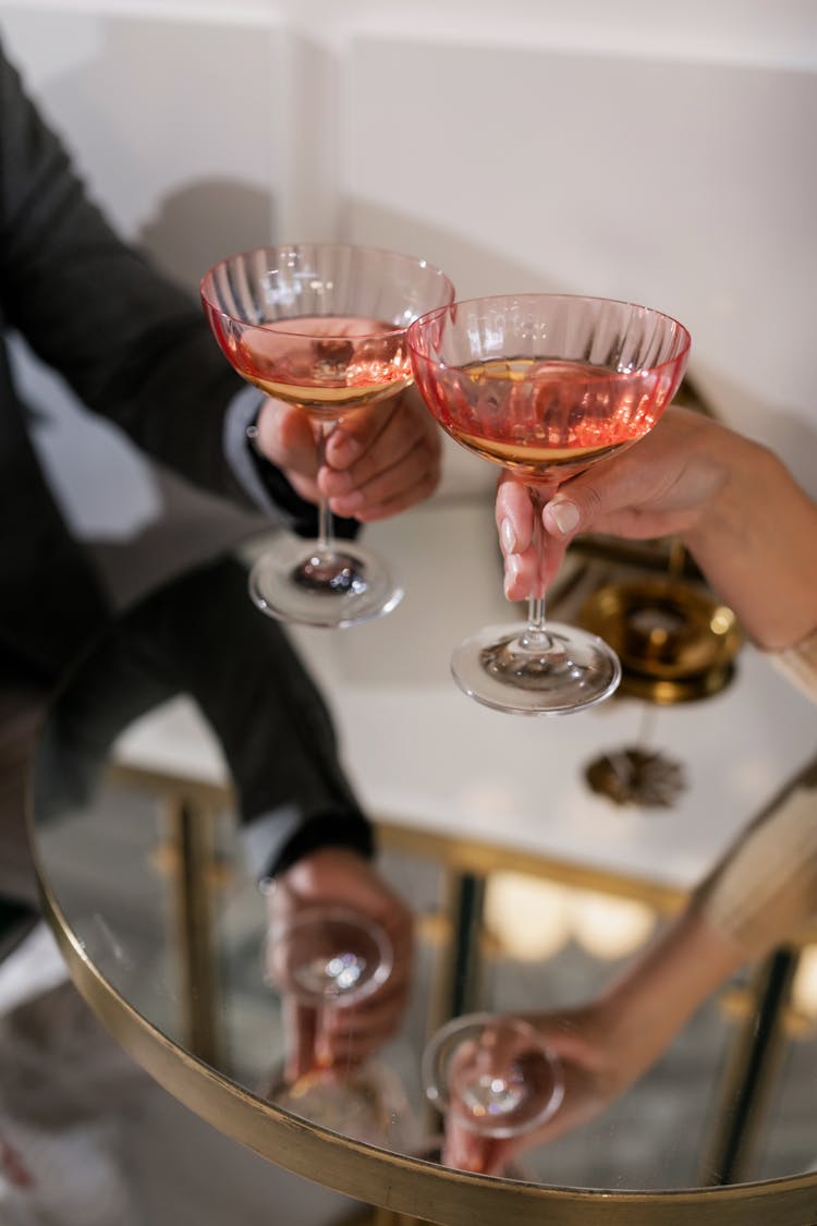 A Couple Toasting Wine Glasses